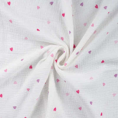 Tissu Double gaze de Coton Petites coeurs roses et parmes sur fond Blanc - Par 10 cm