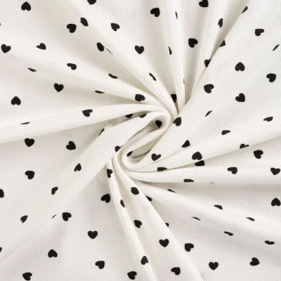 Tissu Jersey Coton Bord côte Coeurs noirs sur fond Ecru - Par 10 cm