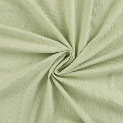 Tissu Jersey Coton ajouré uni Lio Vert anis - Par 10 cm
