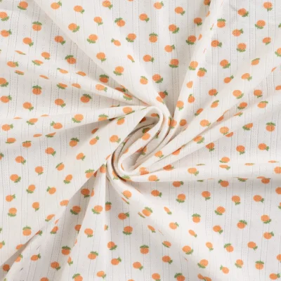 Tissu Jersey Coton ajouré Oranges sur fond Blanc - Par 10 cm