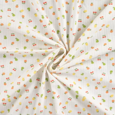 Tissu Jersey Coton ajouré Fruits sur fond Blanc - Par 10 cm