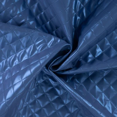 Tissu Matelassé métallisé uni Bleu roi - Par 10 cm