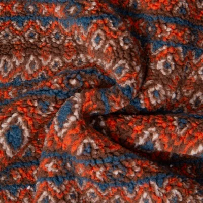 Tissu Fausse fourrure Teddy Sherpa ethnique sur fond Marron chocolat - Par 10 cm