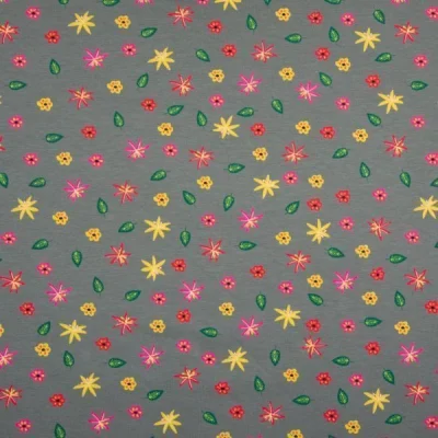 Tissu Jersey Coton Feuilles  et fleurs jaunes rose et vertes sur fond Gris foncé - Par 10 cm