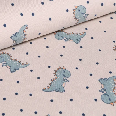 Tissu Jersey Coton Baby Dino sur fond Blanc cassé - Par 10 cm