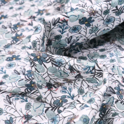 Tissu Popeline de coton Sweet Flower Apolline vert d&#039;eau sur fond Blanc - Par 10 cm