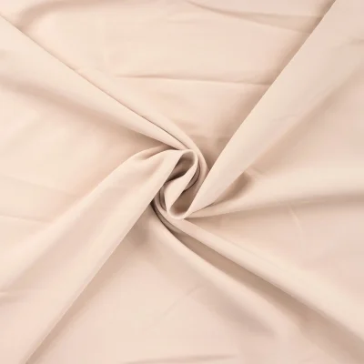 Tissu Sergé extensible uni Beige - Par 10 cm