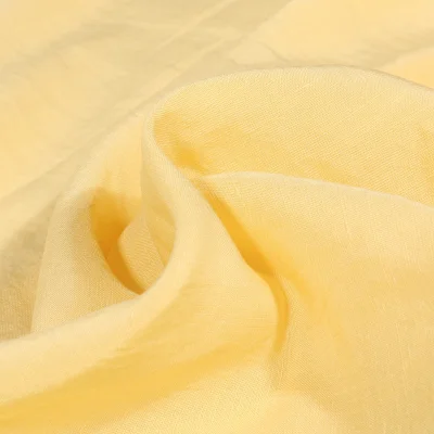 Tissu Viscose Lin Uni Lino sur fond Jaune pastel - Par 10 cm