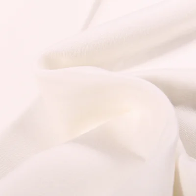 Tissu Jersey Coton Bio uni Blanc cassé - Par 10 cm