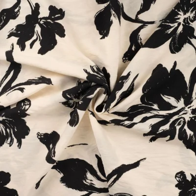 Tissu Viscose texturé Fleurs noires sur fond Ecru - Par 10 cm