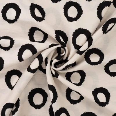 Tissu Viscose texturé Cercles Blanc et Noir sur fond Ecru - Par 10 cm