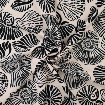 Tissu Polyviscose imprimé Îlo coquillages Noir sur fond Ecru - Par 10 cm