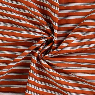 Tissu Voile de Coton Rayures irrégulières sur fond Terracotta - Par 10 cm