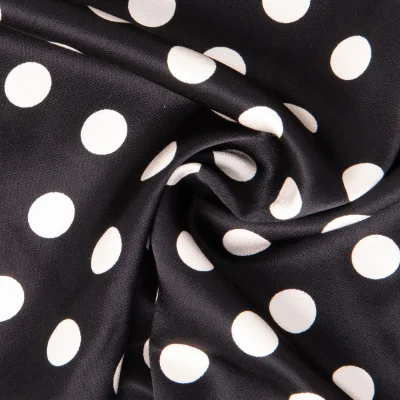 Tissu Viscose Satiné imprimé pois Blanc sur fond Noir - Par 10 cm
