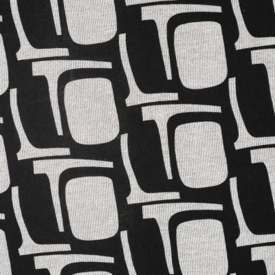 Tissu Jersey Milano Motifs écru sur fond Noir - Par 10 cm