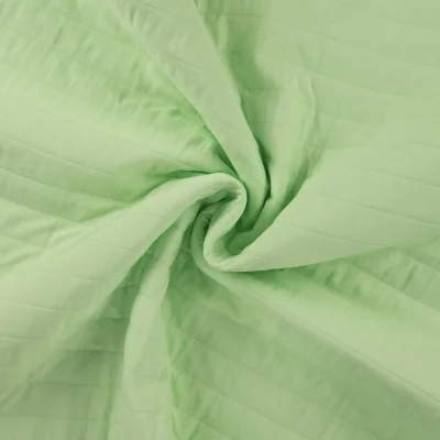 Tissu Coupe-Vent Matelassé uni Vert menthe - Par 10 cm