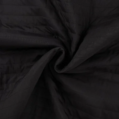 Tissu Coupe-Vent Matelassé uni Noir - Par 10 cm