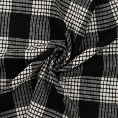 Tissu Polyviscose légèrement gaufré à carreaux noirs sur fond Blanc - Par 10 cm