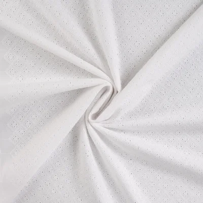 Tissu Coton brodé ajouré Lois uni Blanc - Par 10 cm