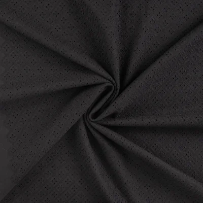 Tissu Coton brodé ajouré Lois uni Noir - Par 10 cm