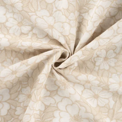 Tissu Coton brodé imprimé Fleurs sur fond Ecru - Par 10 cm
