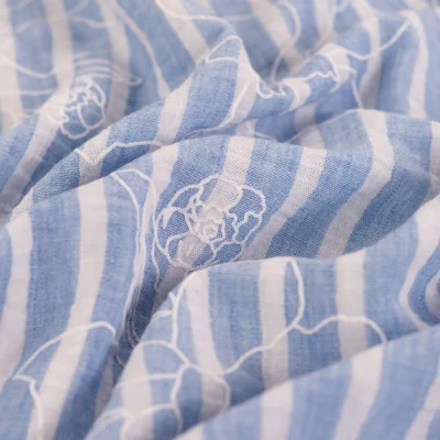 Tissu Aspect Lin rayures et fleurs sur fond Bleu ciel - Par 10 cm