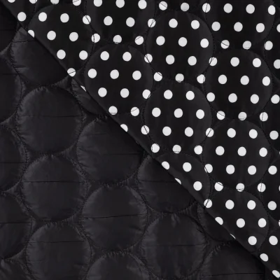 Tissu Doudoune matelassé Betty réversible petits pois Blanc sur fond Noir - Par 10 cm