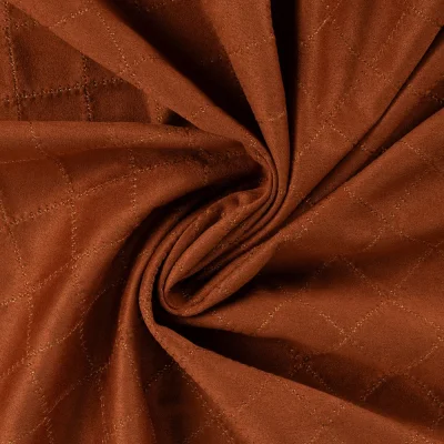 Tissu Suédine Scuba surpiqué motif losanges sur fond Rouille - Par 10 cm