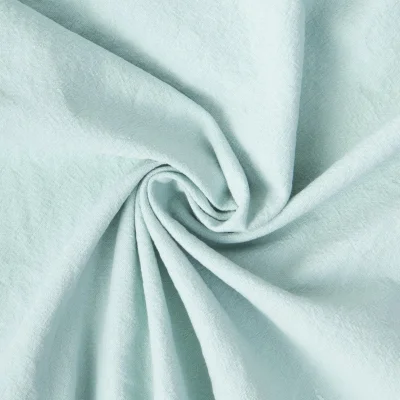 Tissu Coton Lavé aspect Lin uni Vert artique - Par 10 cm