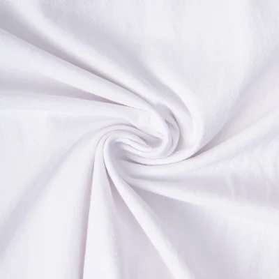 Tissu Coton Lavé aspect Lin uni Blanc - Par 10 cm