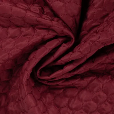 Tissu Doudoune matelassé déperlant uni Bordeaux - Par 10 cm
