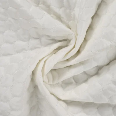Tissu Doudoune matelassé déperlant uni Ecru - Par 10 cm