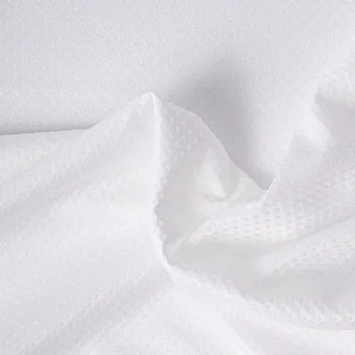 Tissu Antidérapant Doris dessous de tapis pois en relief Blanc - Par 10 cm