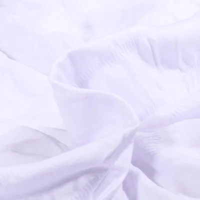 Tissu Jersey Coton smocké uni Blanc - Par 10 cm