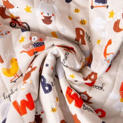Tissu Coton Matelassé réversible Ray alphabet coloré et pois sur fond Ecru - Par 10 cm