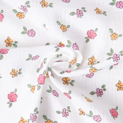 Tissu Double gaze de Coton Grace petites fleurs sur fond Blanc - Par 10 cm