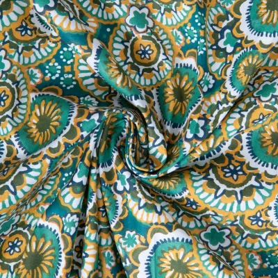 Tissu Coton imprimé Gaudi correze rosaces Vert canard sur fond Bleu pétrole - Par 10 cm