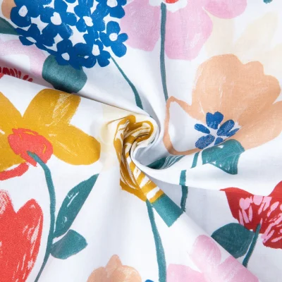 Tissu Coton imprimé Aya fleurs Multicolore sur fond Blanc - Par 10 cm