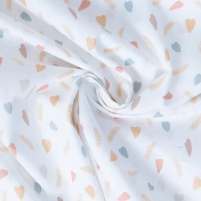 Tissu Coton imprimé Monica herault coeurs Multicolore sur fond Blanc - Par 10 cm