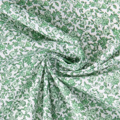 Tissu Coton imprimé Arty Léonie Vert sur fond Blanc - Par 10 cm