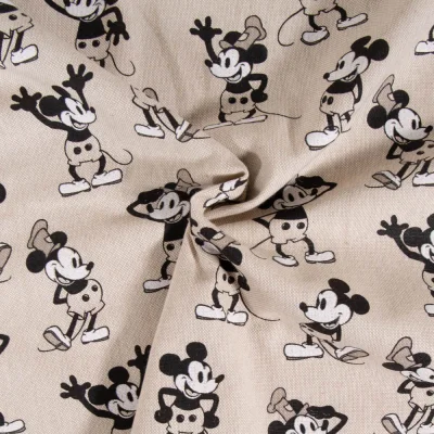 Tissu Toile de Coton aspect lin Mickey sur fond Beige - Par 10 cm