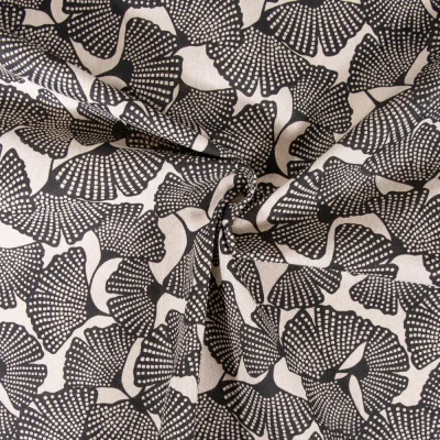 Tissu Toile de Coton aspect lin Feuilles de Ginkgo sur fond Beige - Par 10 cm