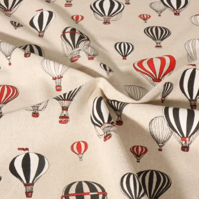 Tissu Toile de Coton Montgolfières sur fond Beige - Par 10 cm