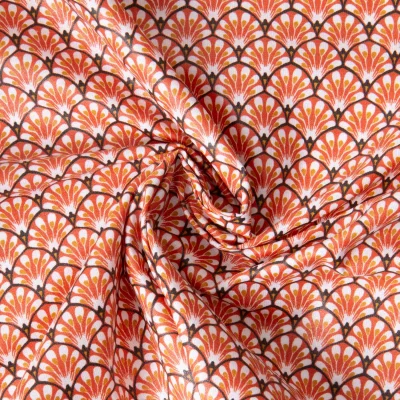 Tissu Coton enduit éventails Gaudi sur fond Terracotta - Par 10 cm