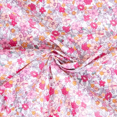 Tissu Coton enduit Agatha fleuris Rose sur fond Blanc - Par 10 cm
