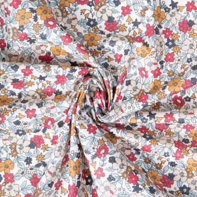 Tissu Coton enduit Agatha fleuris Ocre sur fond Blanc - Par 10 cm