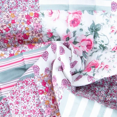 Tissu Coton Matelassé réversible patchwork végétal Rose sur fond Blanc - Par 10 cm