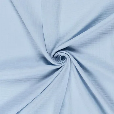 Tissu Double gaze de Coton uni  Bleu layette - Par 10 cm