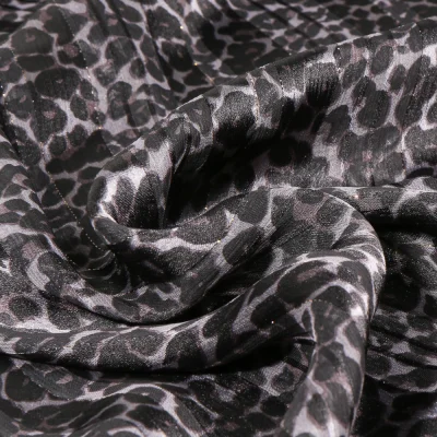 Tissu Mousseline Cheetah sur fond Gris - Par 10 cm