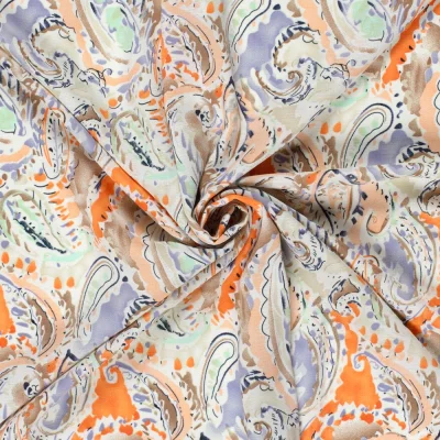 Tissu Polyester Paisley sur fond Parme - Par 10 cm